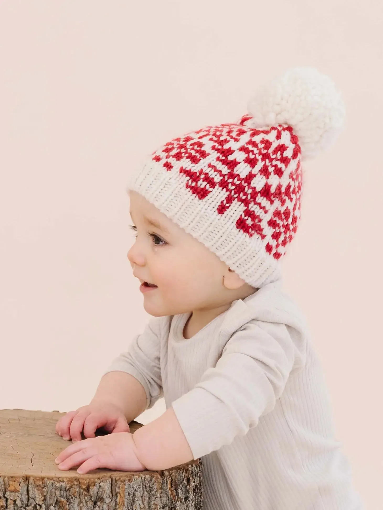 Snowfall in Red Child's Winter Hat